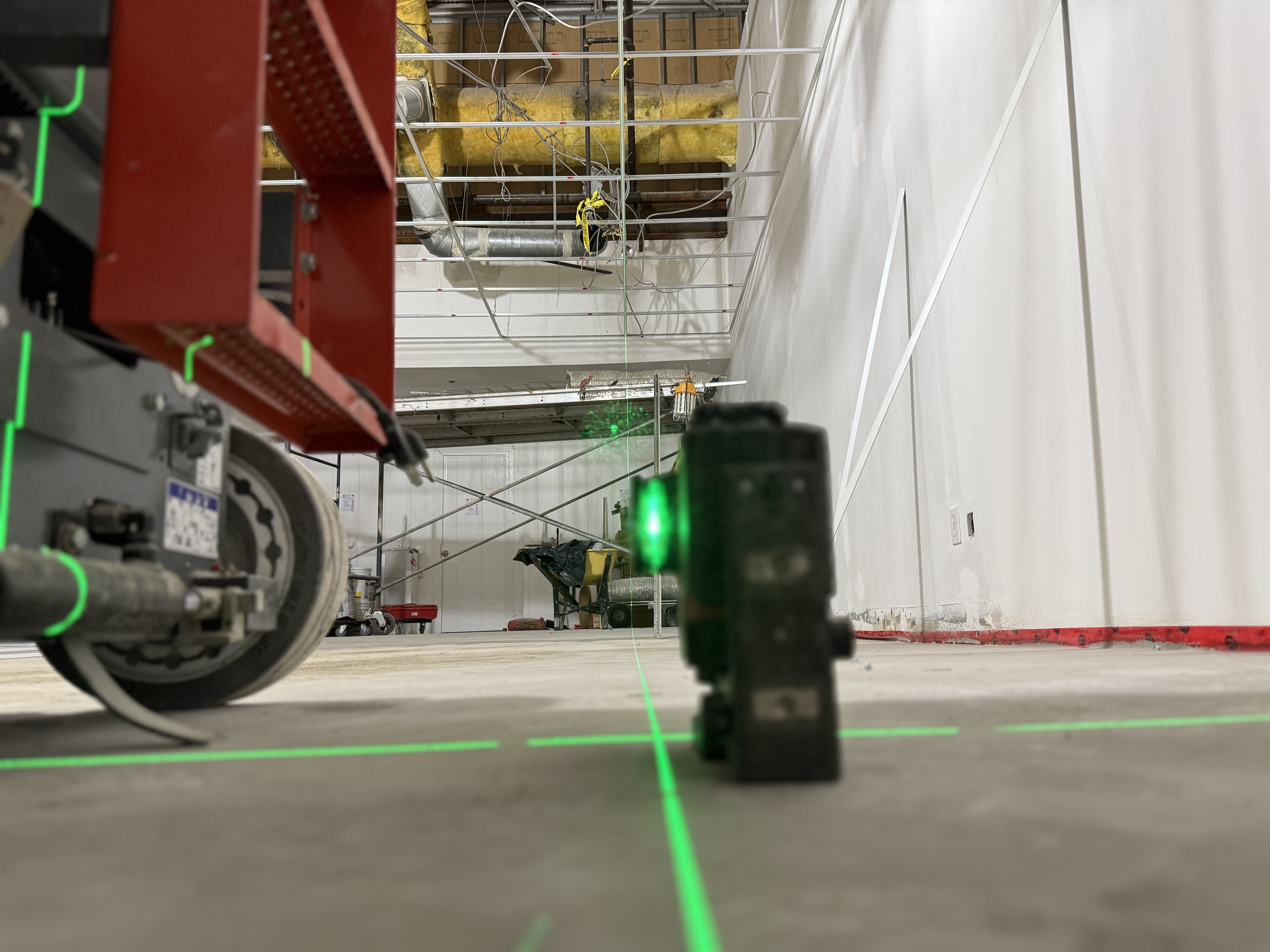 Laser layout for a commercial T-bar ceiling installation