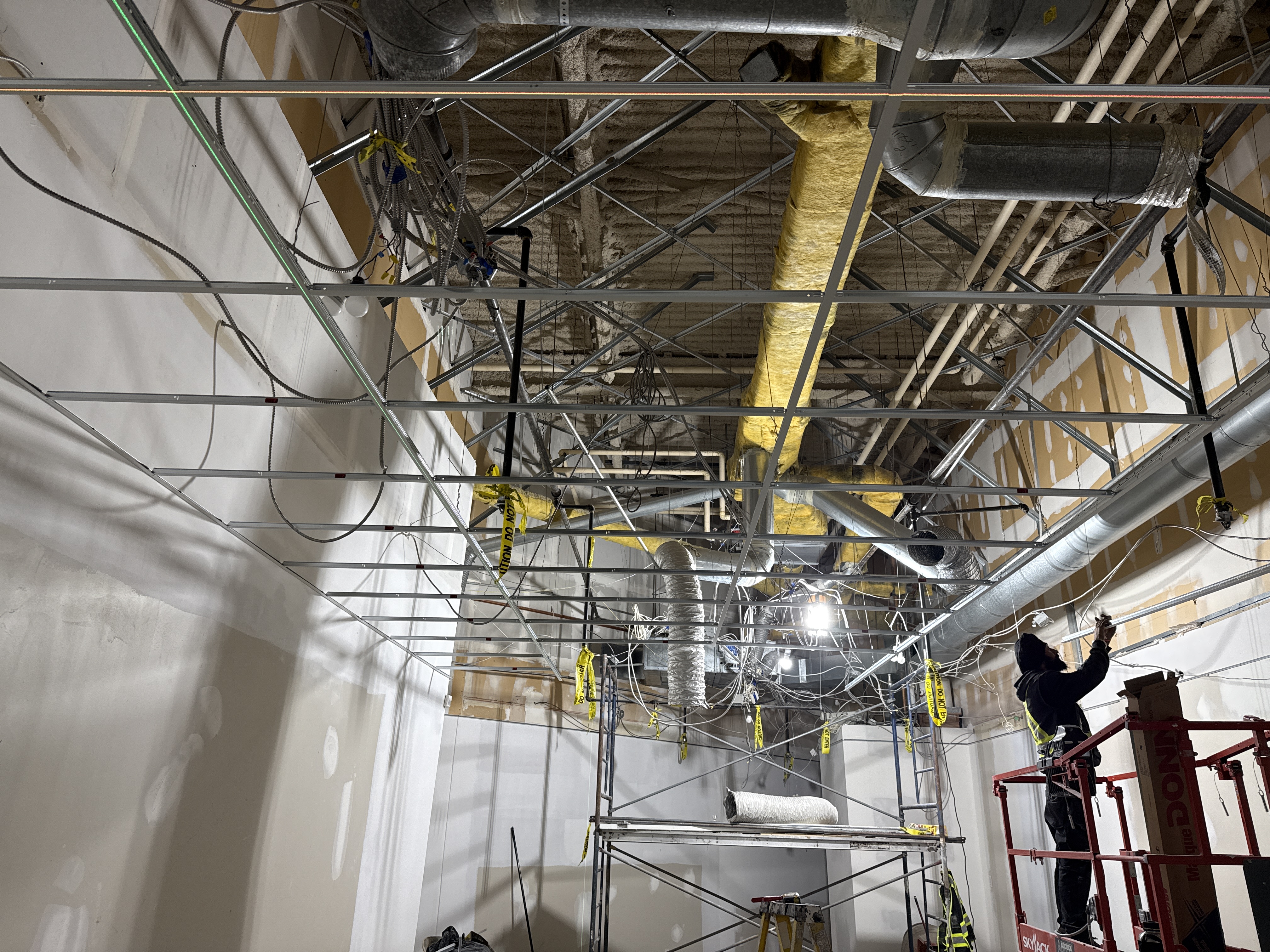 Suspended T-bar ceiling grid installation at Lansdowne Centre