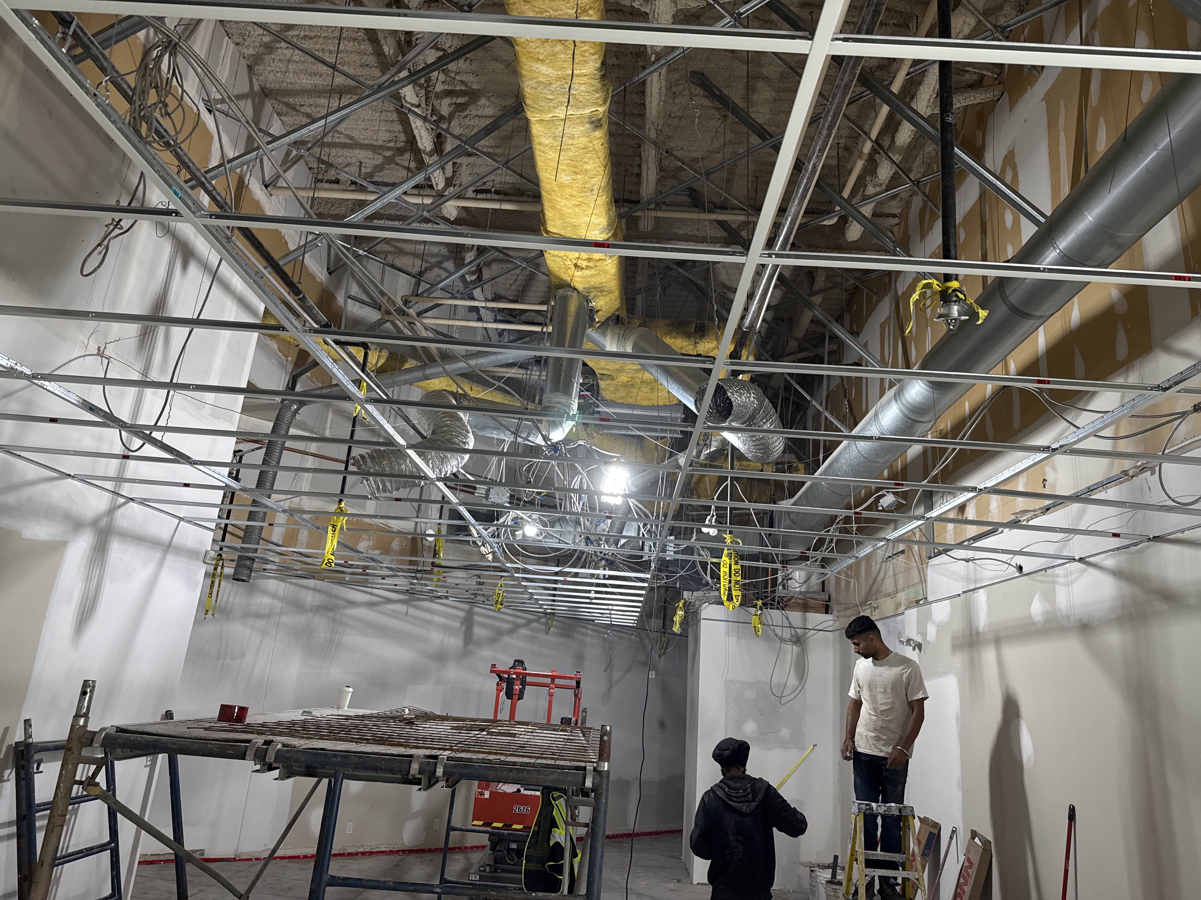 Commercial ceiling grid installation in progress in Richmond