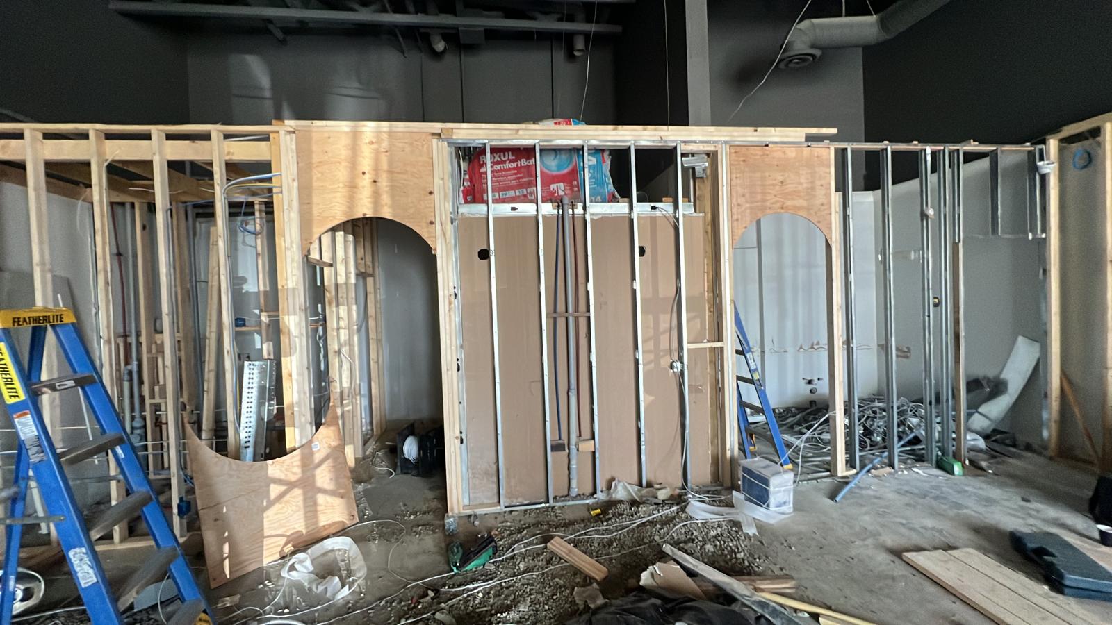 Wood and steel framing for a commercial gym interior