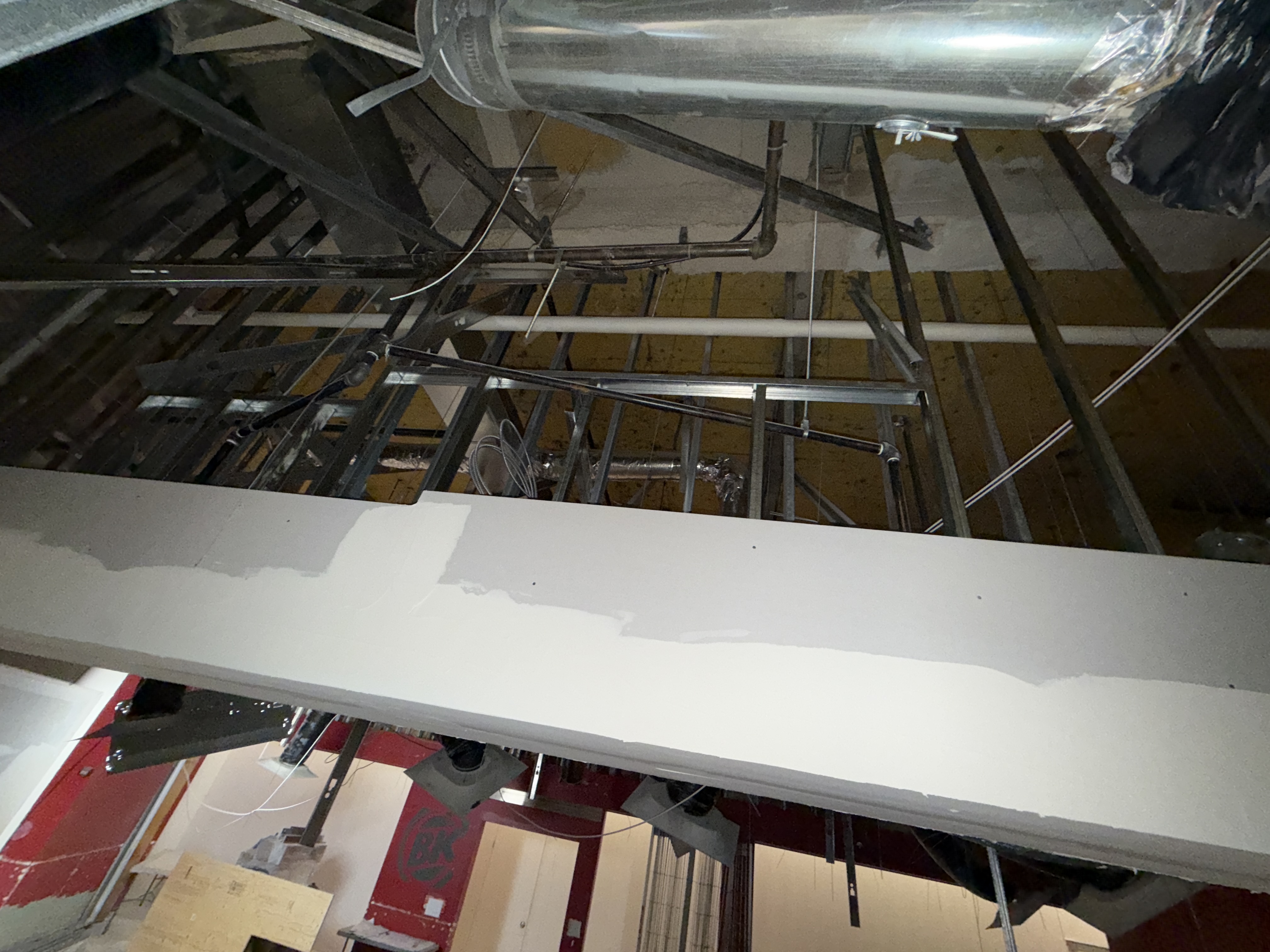 Drywall bulkhead construction at Burger King Surrey Central Mall