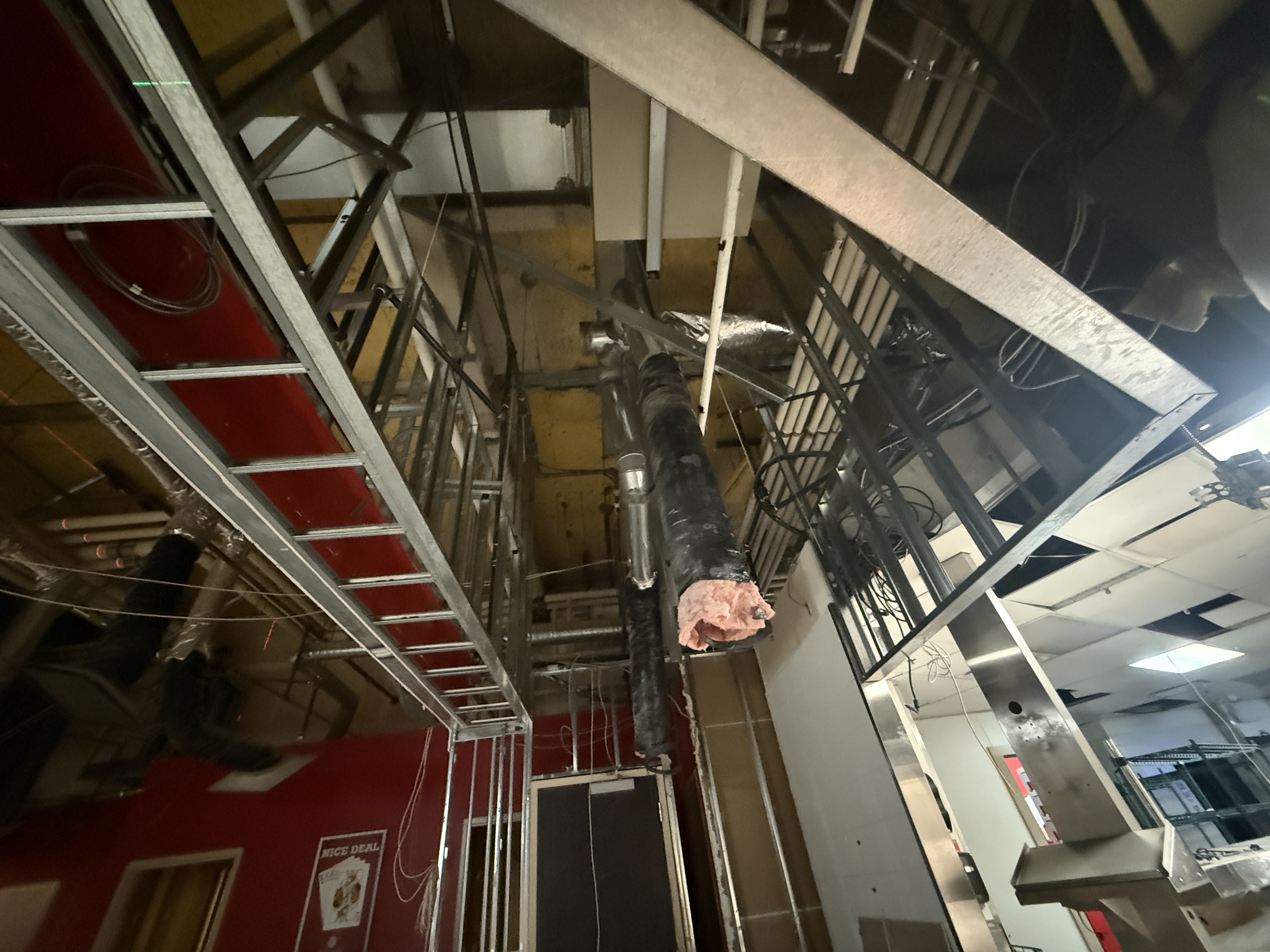 Bulkhead framing and ceiling coordination at Burger King in Surrey BC