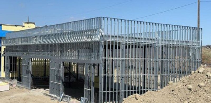 Large commercial building exterior framed with light-gauge steel studs